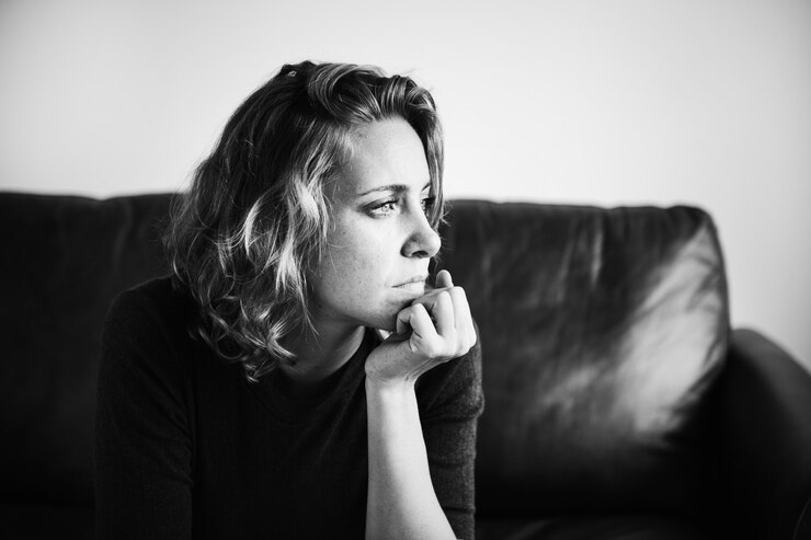 Black and White Portrait of Woman Suffering